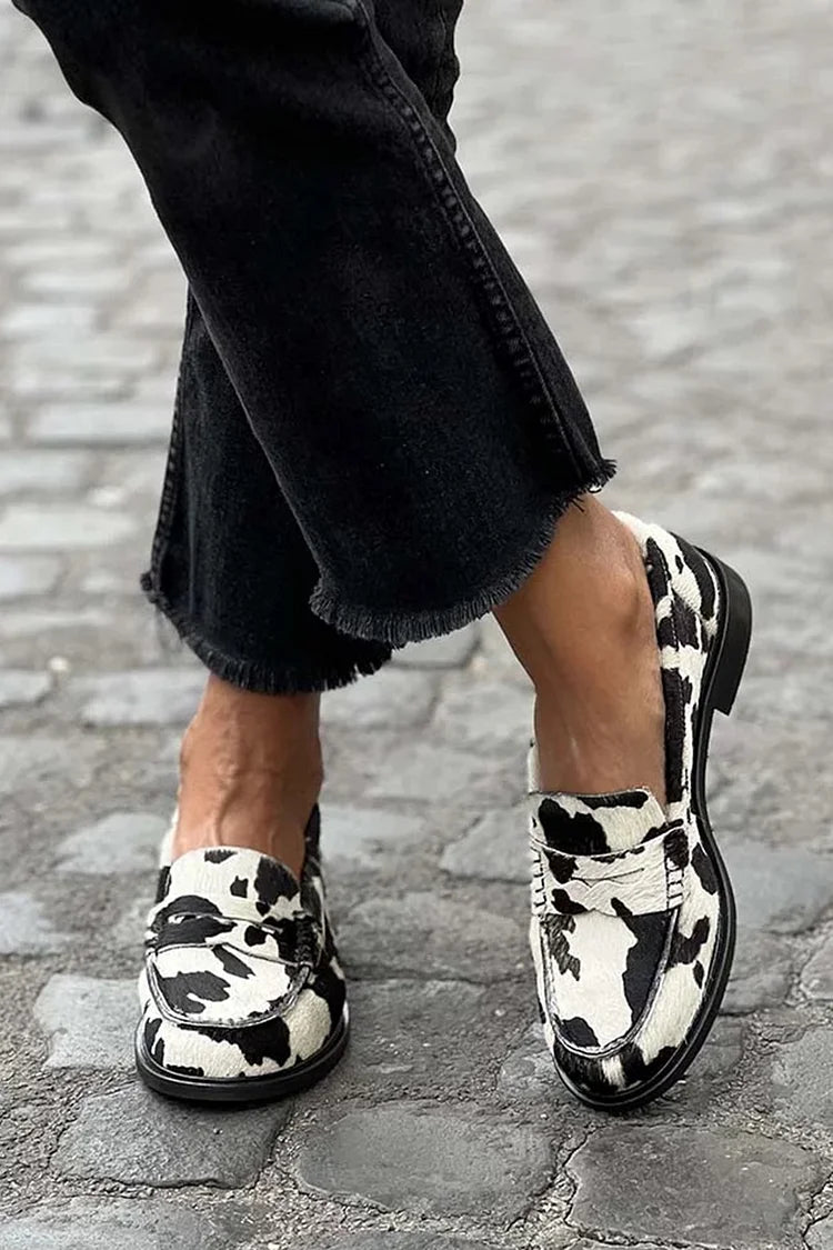 NORTHLINE STUDIO | COW-PRINT LOAFERS
