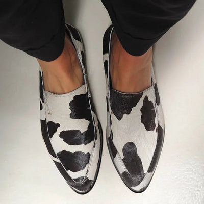 NORTHLINE STUDIO | COW PRINT SLIP-ONS