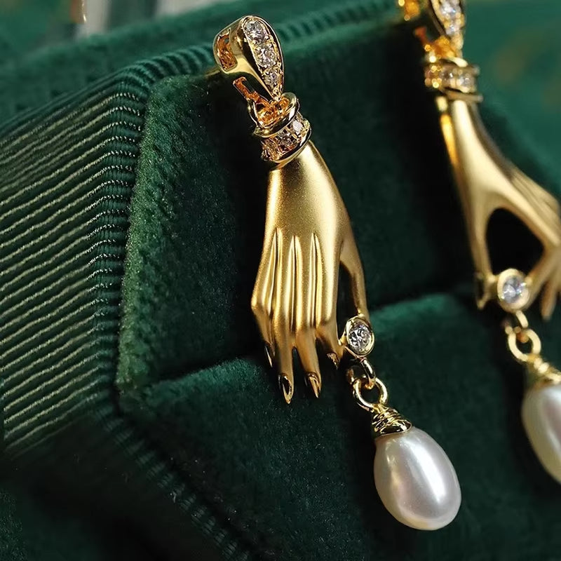Gilded Hand & Pearl Drop Earrings