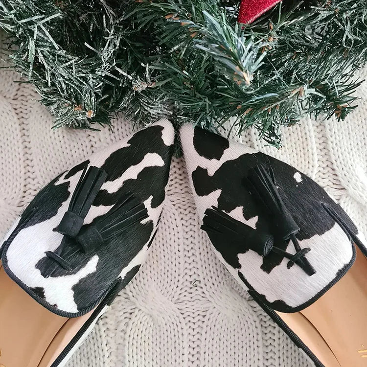 NORTHLINE STUDIO | COW PRINT LOAFERS WITH TASSEL