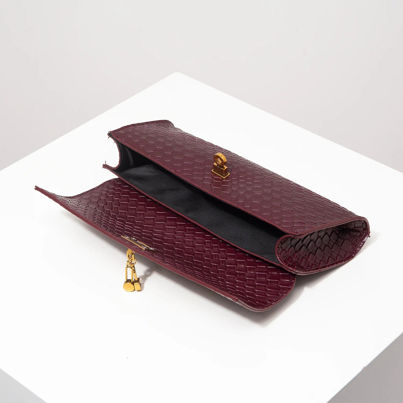 Venezia Woven Baguette Clutch