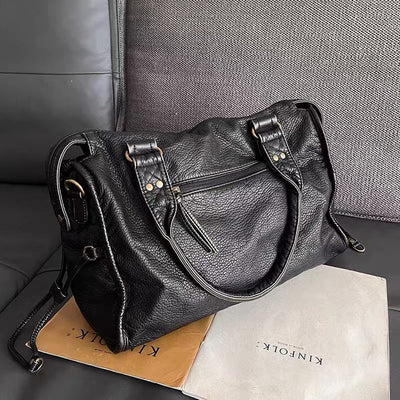 Elegant vintage leather black handbag